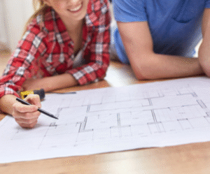 2 people planning custom home design 